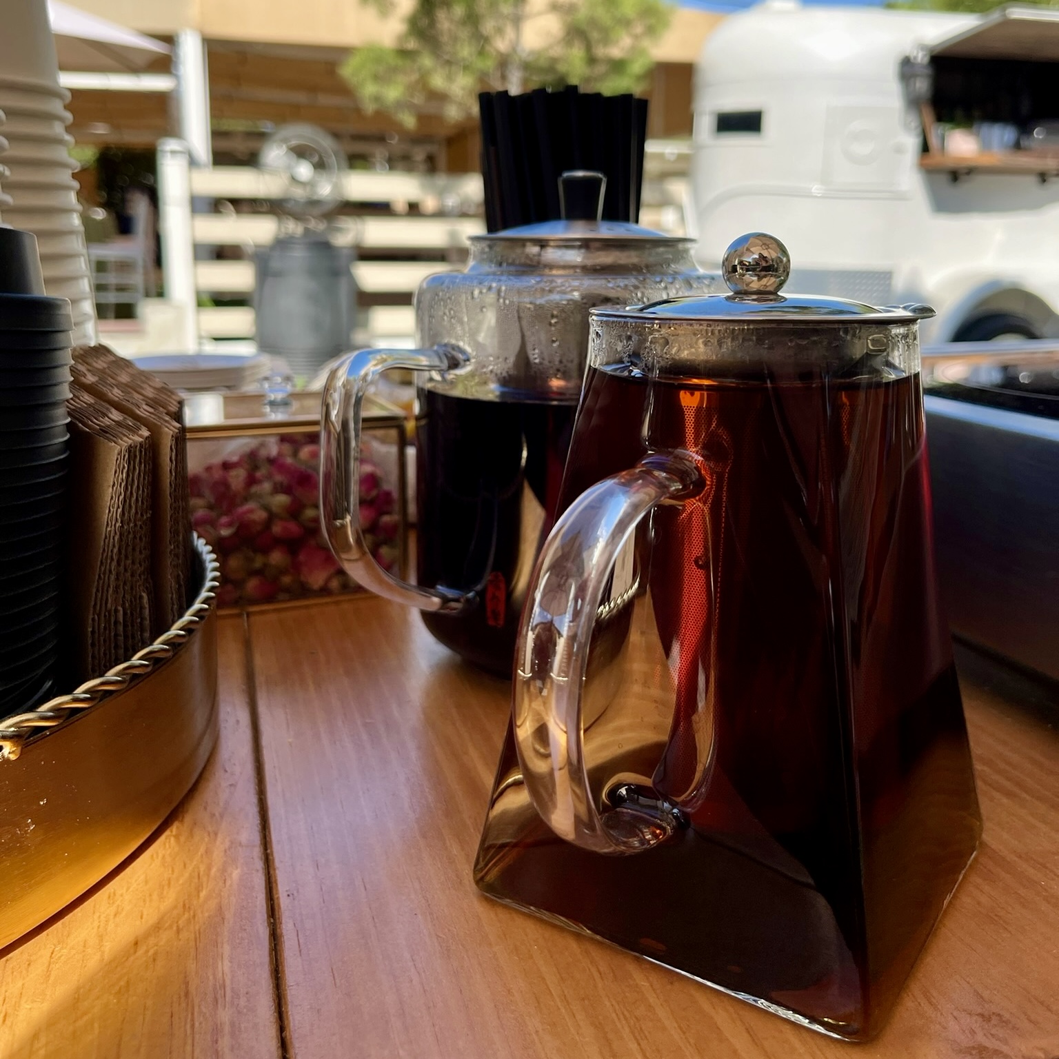 Glass teapots with brewed tea